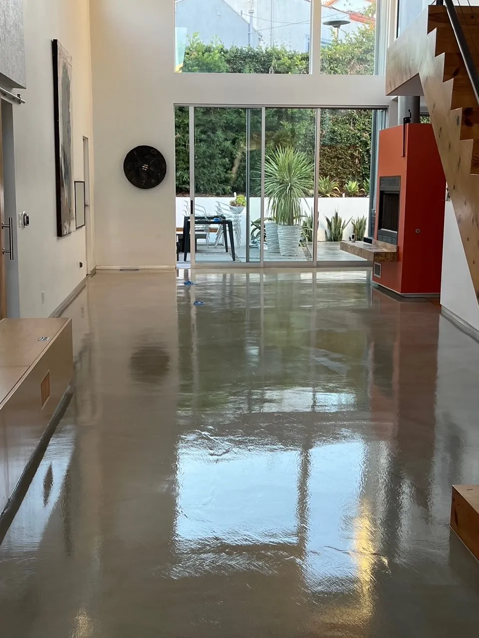 High-gloss polished concrete entry in a modern home