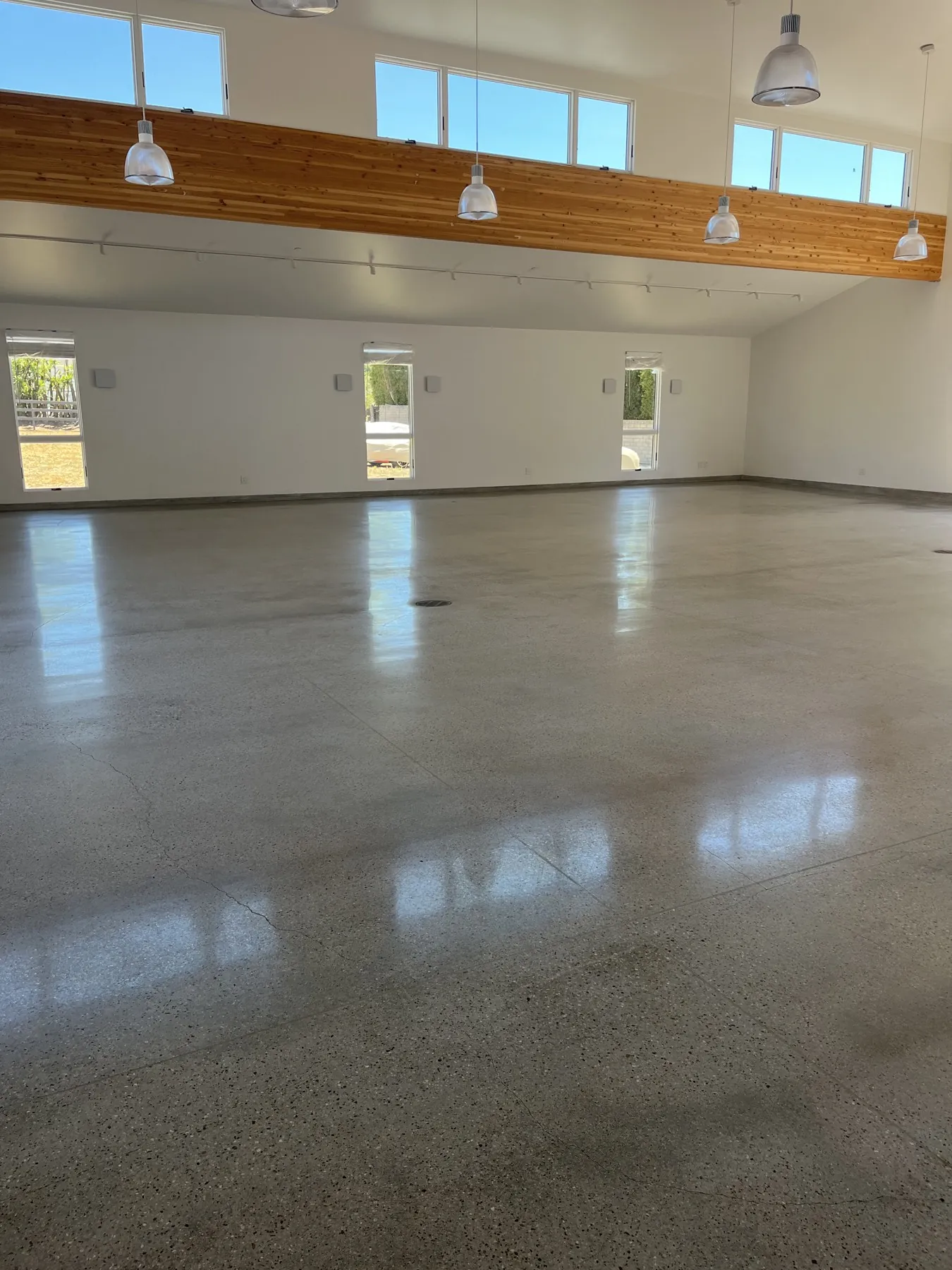 Polished concrete floor in a large open hall