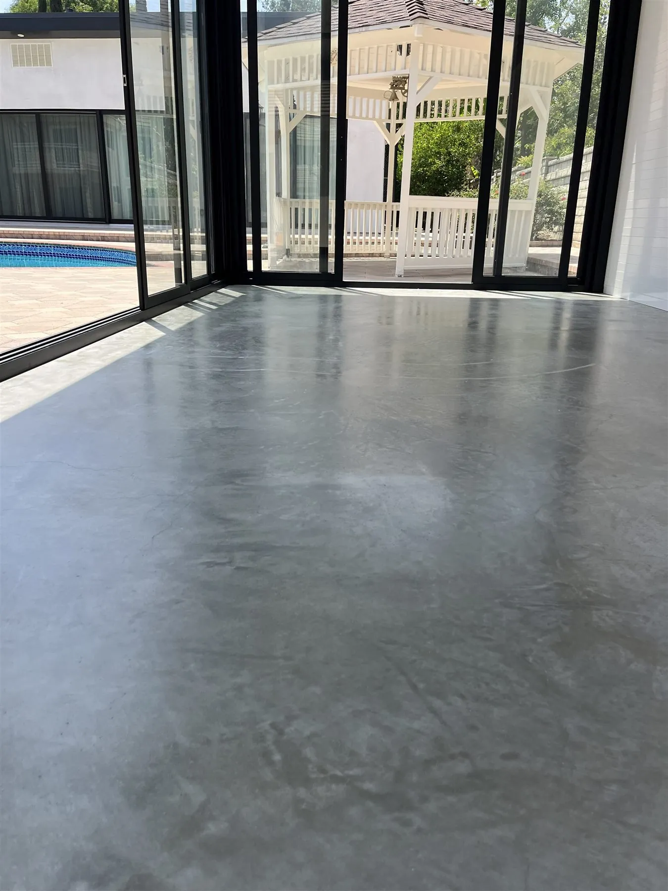 Polished concrete floor in a guest house by the pool
