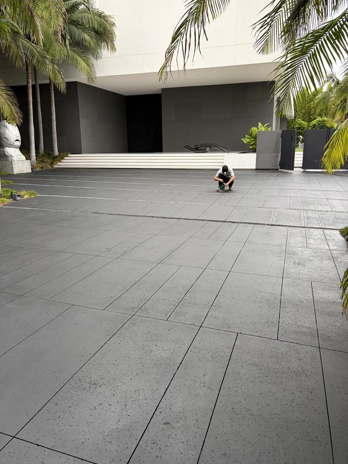 Sealed concrete driveway at a modern home